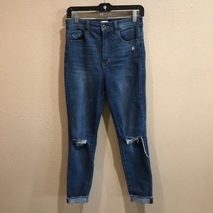 Sneakpeek denim distressed skinny jeans